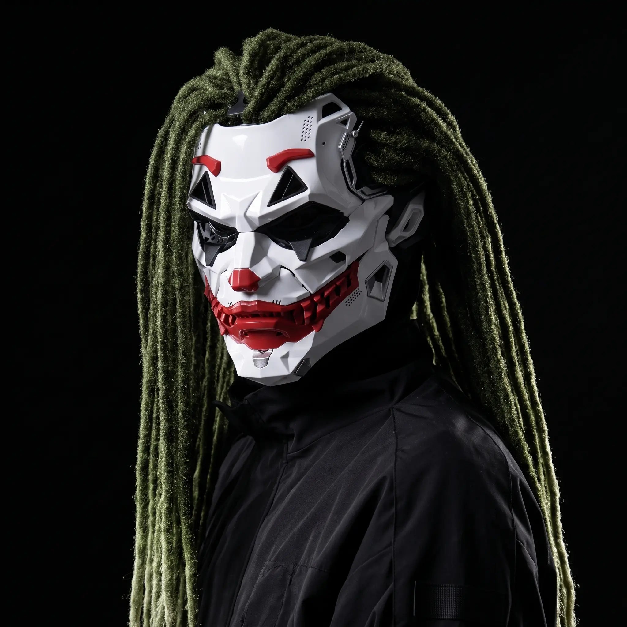 Man wearing the MaskVault Villain Mask with long green dreadlocks and black jacket