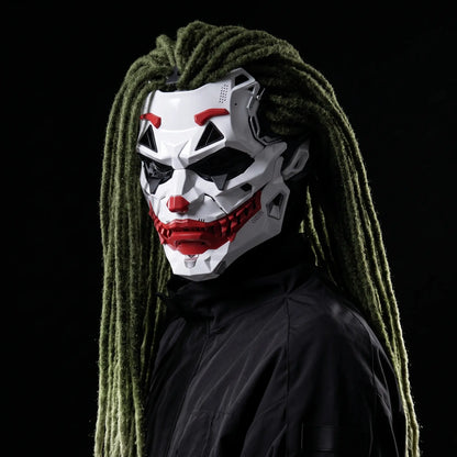 Man wearing the MaskVault Villain Mask with long green dreadlocks and black jacket